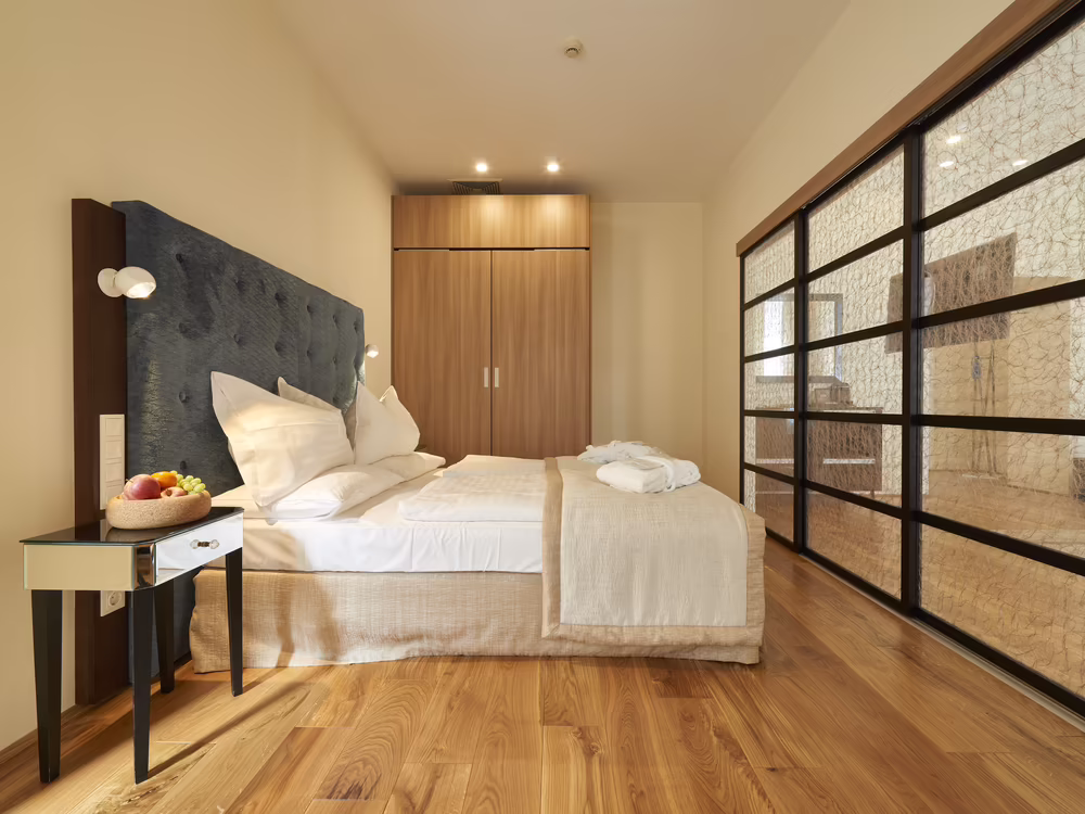 Doppelbett der Deluxe Suite